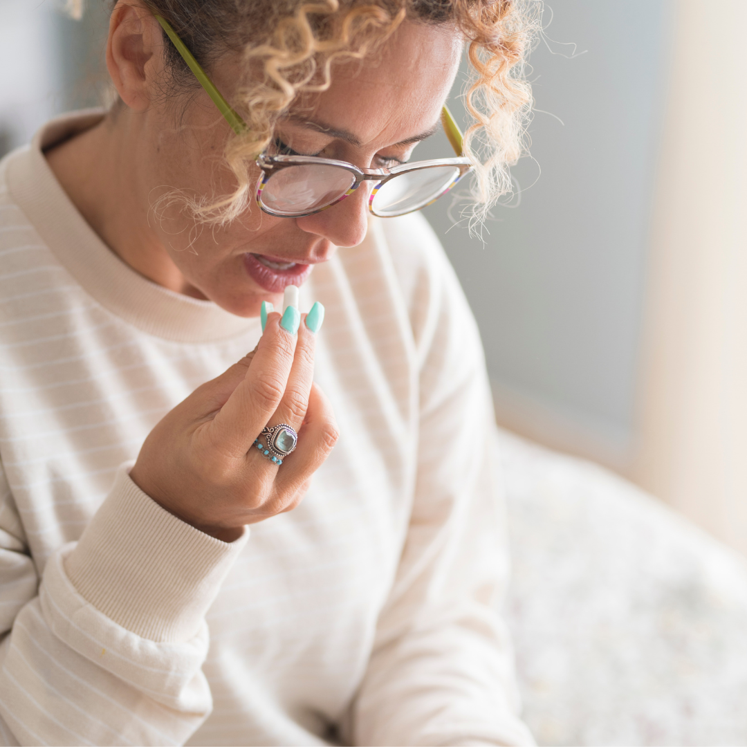 woman taking thyroid medication